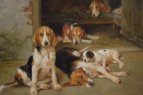 fig 2. An oil painting depicting several foxhound puppies and a fox terrier resting on a barn floor, set within a heavy carved gilded frame.