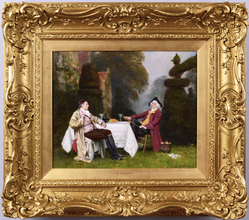 A framed oil painting depicting two gentlemen in eighteenth-century attire seated at a table in a garden surrounded by topiary.