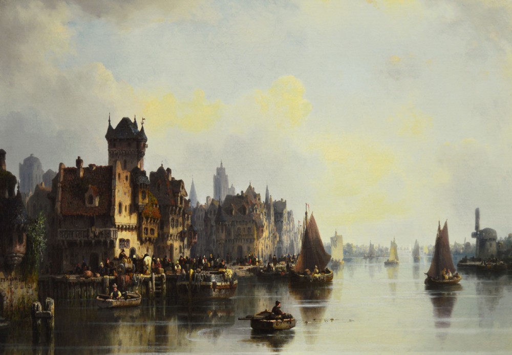 An antique 19th-century oil painting depicting a Continental river quayside with historical buildings and sailing vessels, housed in a carved gilt gesso frame. View II