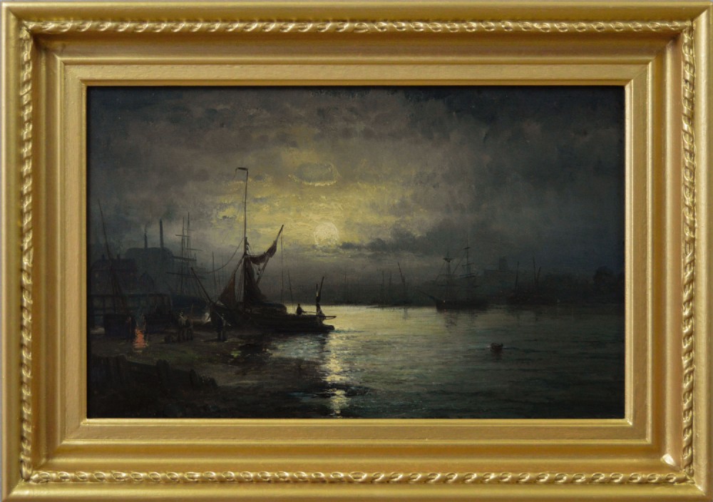 A framed Victorian oil painting depicting sailing ships under a full moon on a river with gold gilded framing.