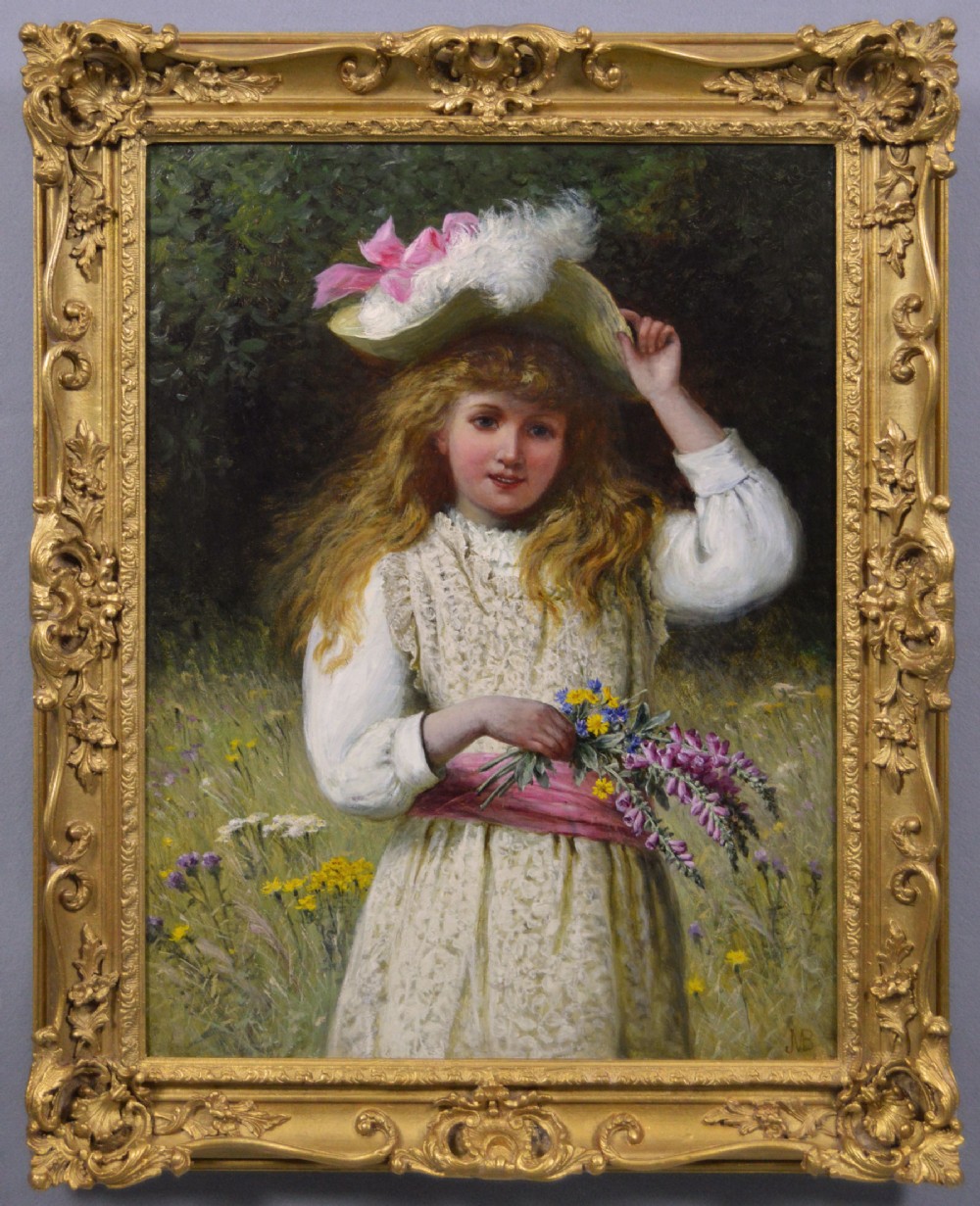 A Victorian oil painting depicting a young girl with blonde hair in a floral meadow holding wildflowers, enclosed in an ornate gold giltwood frame.