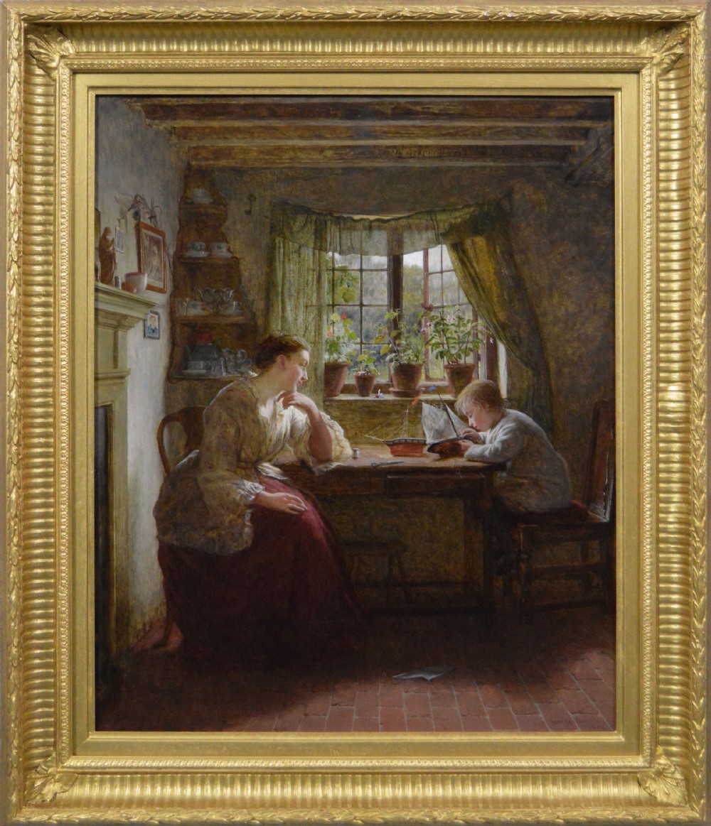 A framed 19th-century oil painting depicting a mother seated at a wooden table watching her young son play with a toy boat inside a sunlit cottage interior.