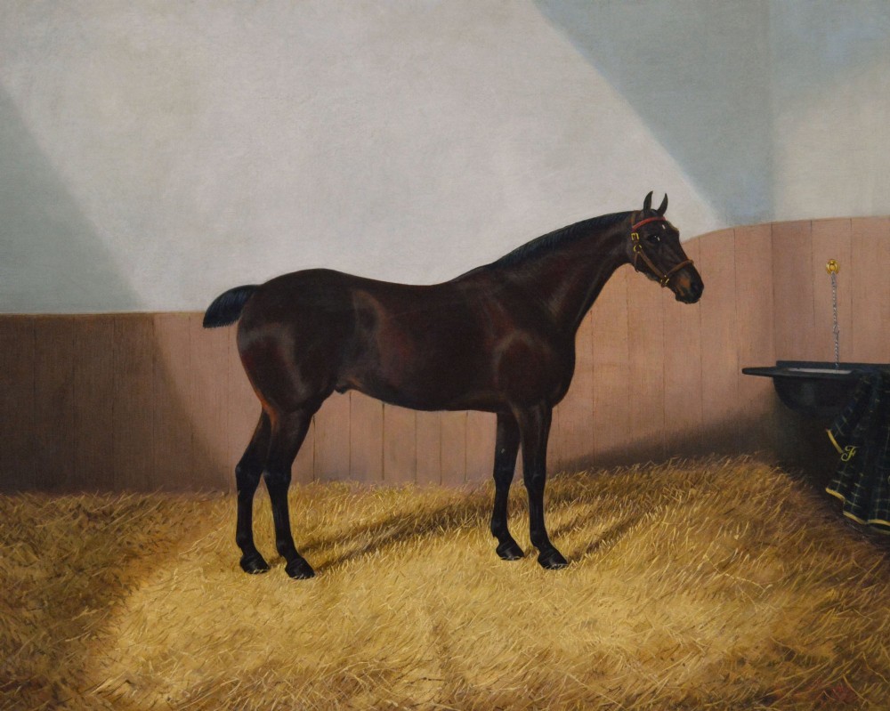 An oil painting depicting a dark bay horse standing in a straw-filled stable stall, encased within a heavy gold gilt frame. View II