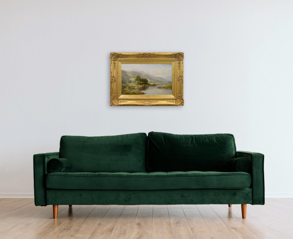 An oil painting depicting cattle watering in the River Llugwy with Welsh mountains in the background, housed in an elaborate gold gilt frame. View XII