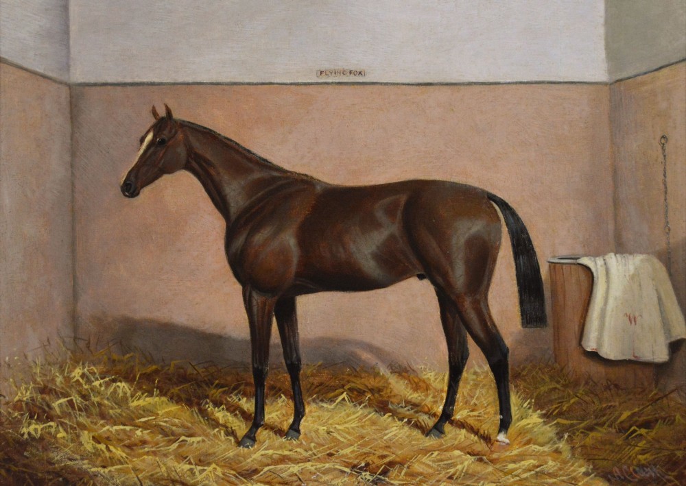 An oil painting of a brown bay racehorse standing in a straw-filled stable stall set within an ornate gold gilt frame. View II