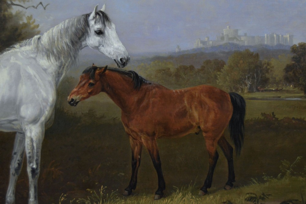 A 19th-century oil painting depicting a grey mare and a bay foal standing in a rural landscape with Windsor Castle in the distance, set within a beaded gold frame. View IV