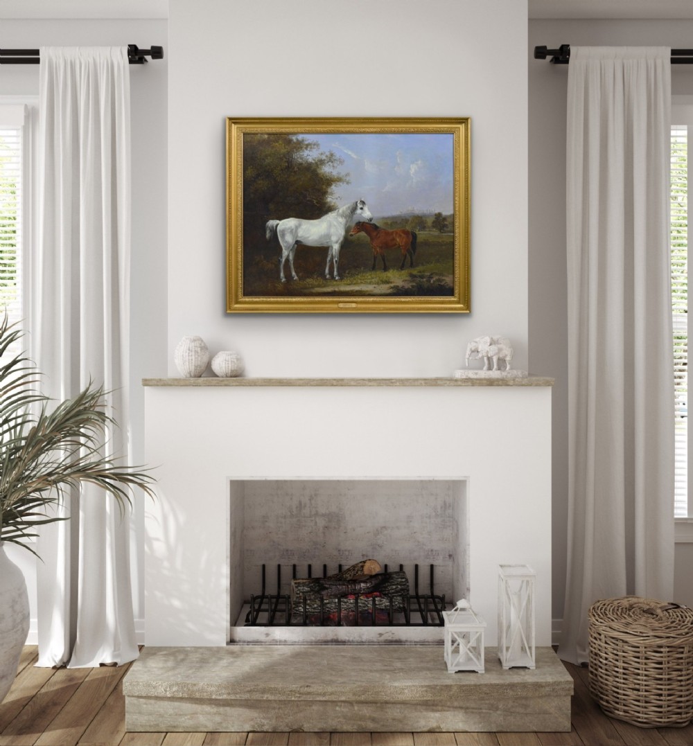 A 19th-century oil painting depicting a grey mare and a bay foal standing in a rural landscape with Windsor Castle in the distance, set within a beaded gold frame. View IX