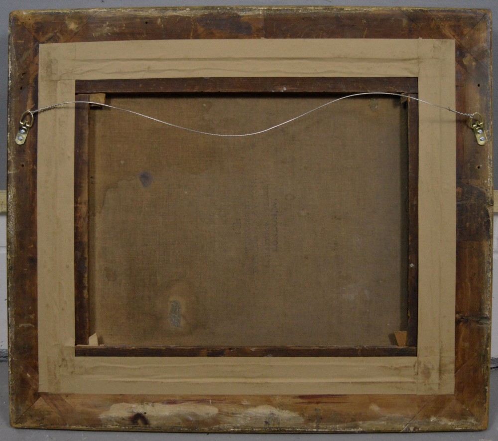 An oil painting depicting several foxhound puppies and a fox terrier resting on a barn floor, set within a heavy carved gilded frame. View X