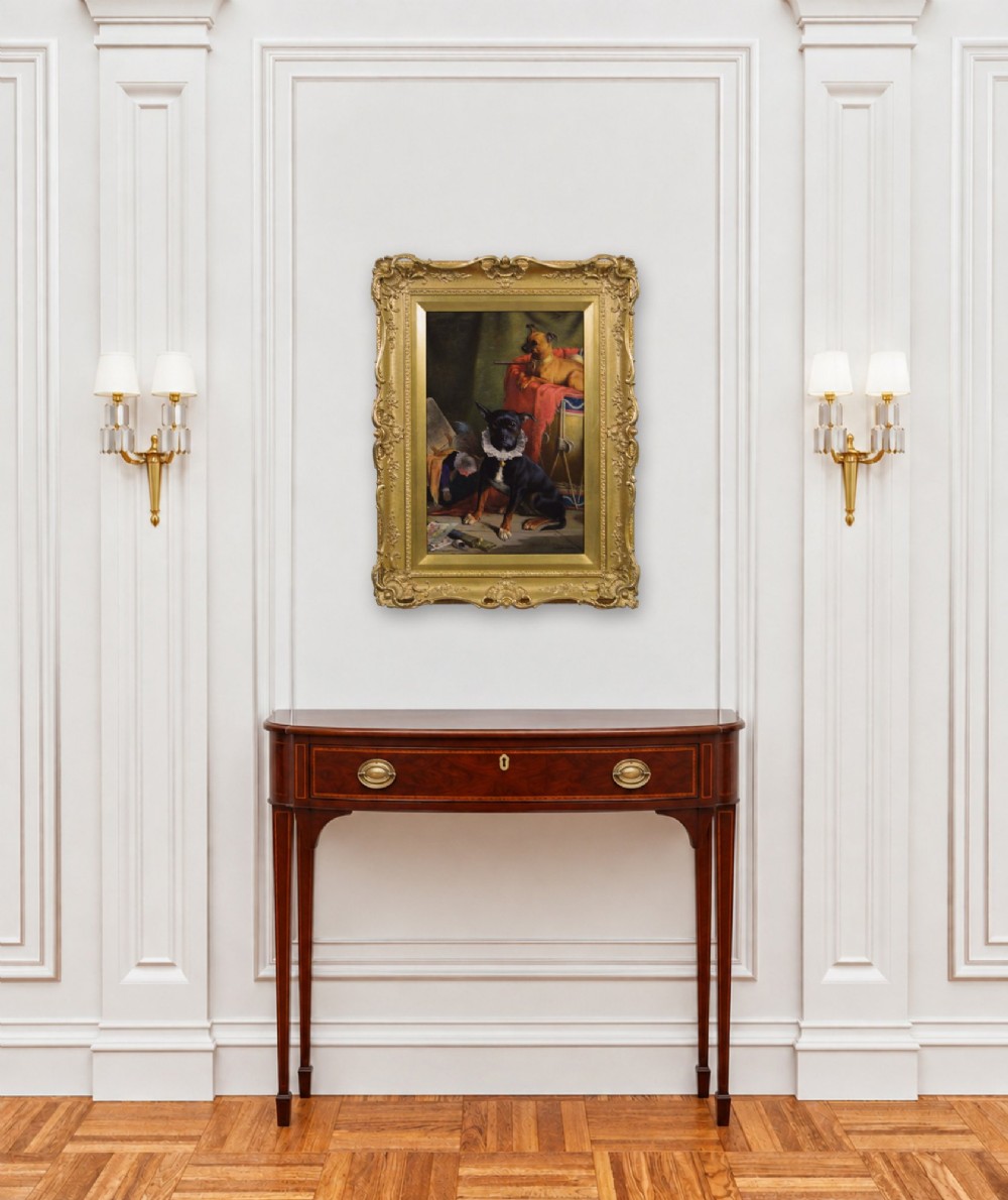 A vertical oil painting on canvas depicting two small dogs in a decorative setting, enclosed within an ornate carved gilt wood frame. View IX