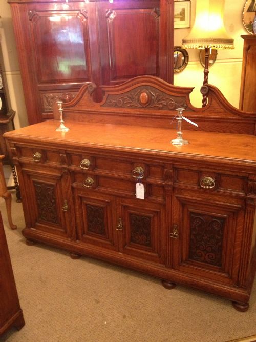 Antique Victorian Carved Oak Sideboard with Elaborate Brass Handles