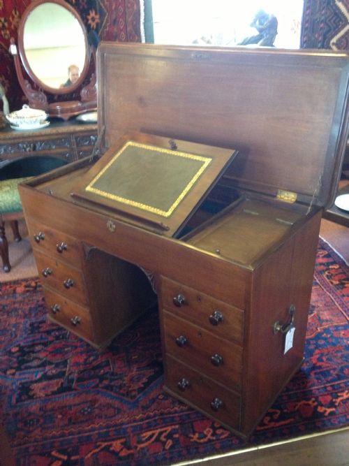 fig 1. Antique George III Mahogany campaign desk in mahogany with writing slopes and hidden compartments