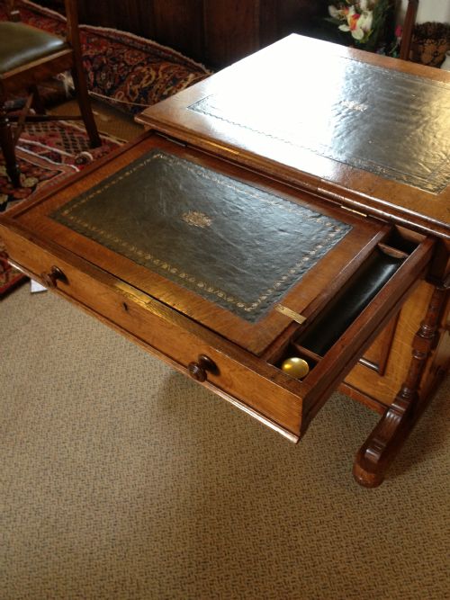 fig 2. Antique oak Davenport desk with an unusual flat top and tooled leather