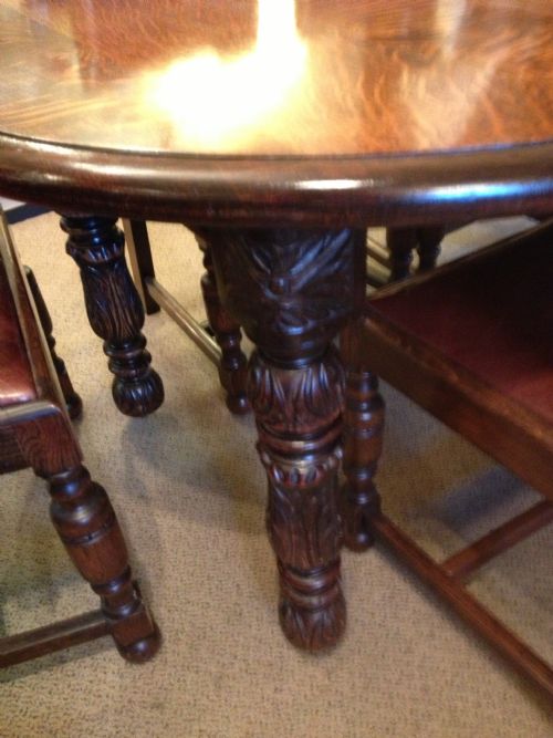 fig 1. Antique late Victorian solid oak wind out dining table with three leaves