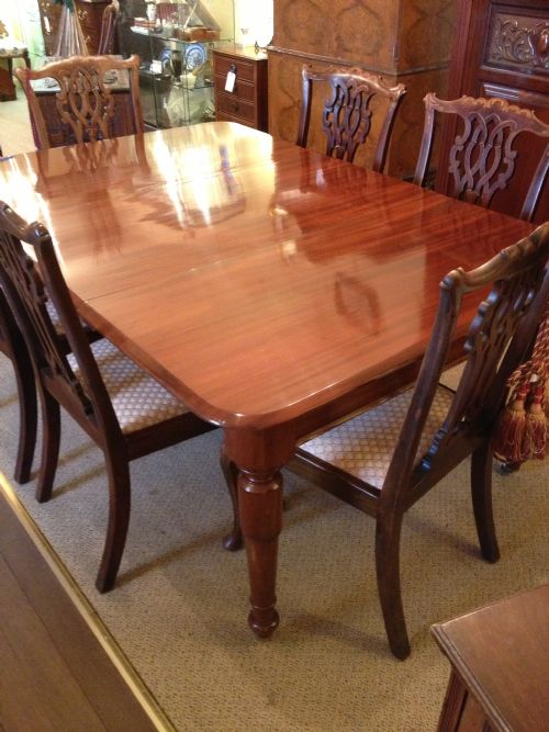 fig 2. Antique late Georgian six seater pull out dining table on turned legs in mahogany