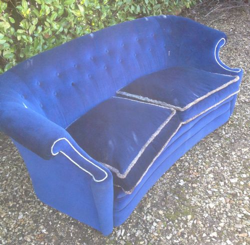 fig 1. Antique Edwardian sofa with feather seat cushions. Attractive scroll arms and crescent shape