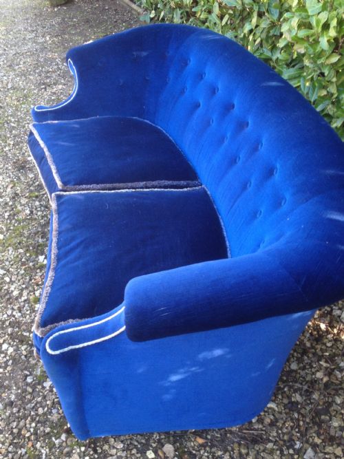 fig 2. Antique Edwardian sofa with feather seat cushions. Attractive scroll arms and crescent shape