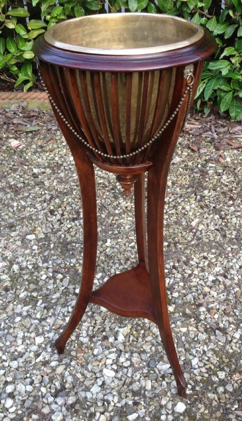Antique Edwardian Plant Stand in Mahogany . Original Brass Liner and Decorative Chains