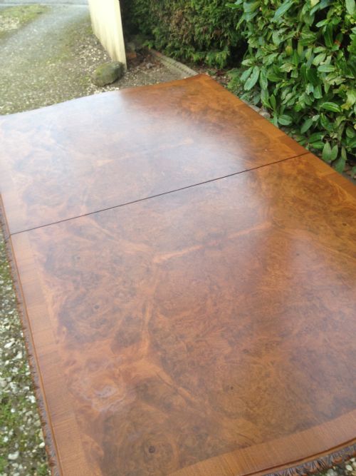 fig 2. Six seater burr walnut pull out dining table on carved cabriole legs c 1920