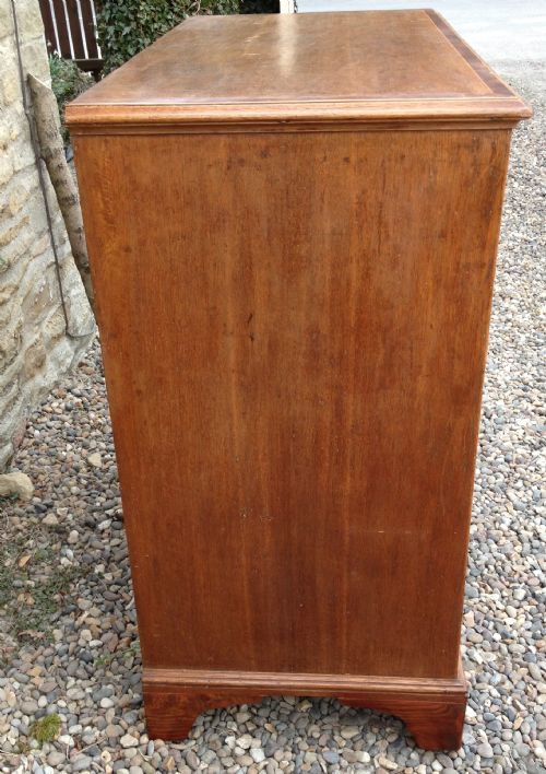 fig 1. Antique inlaid oak four height chest of drawers with original brass swan neck handles