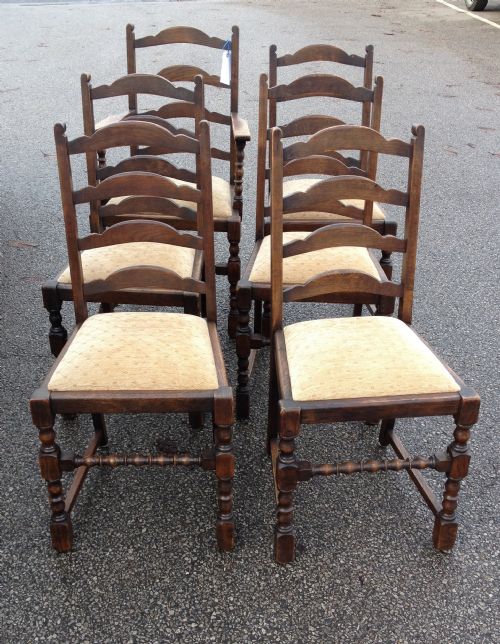 Set of Six Solid Oak Dining Chairs on Bobbin Turned Supports with Ladder Backs Circa 1920