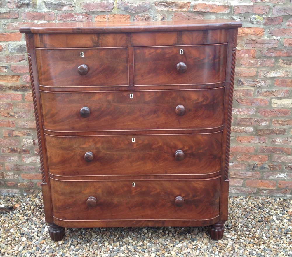 Antique Victorian flame mahogany four height chest of drawers