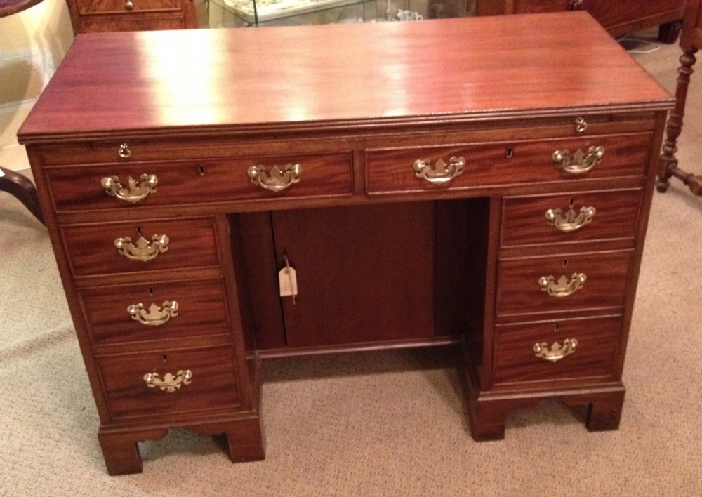 Antique Edwardian solid mahogany twin pedestal desk with original solid brass handles
