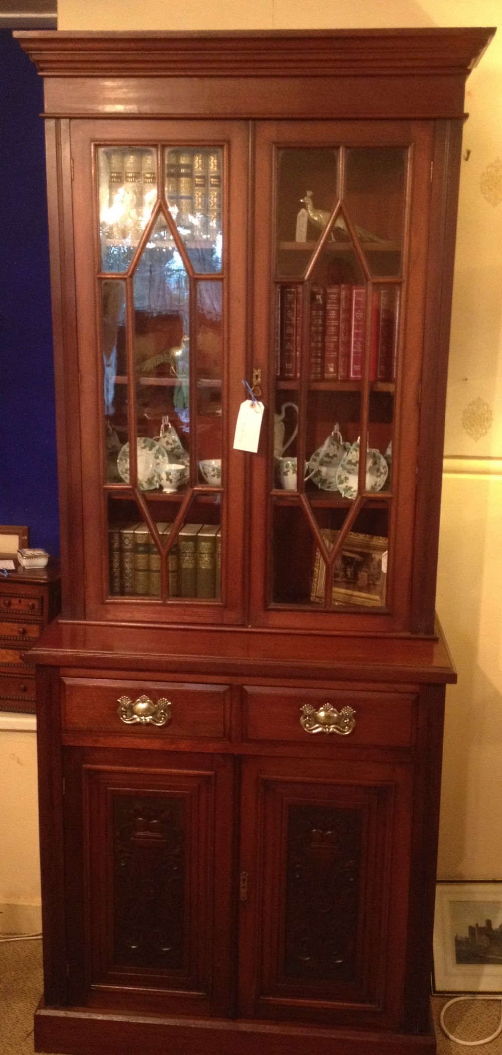 Antique Victorian Mahogany two door bookcase over cupboard and drawers circa 1880