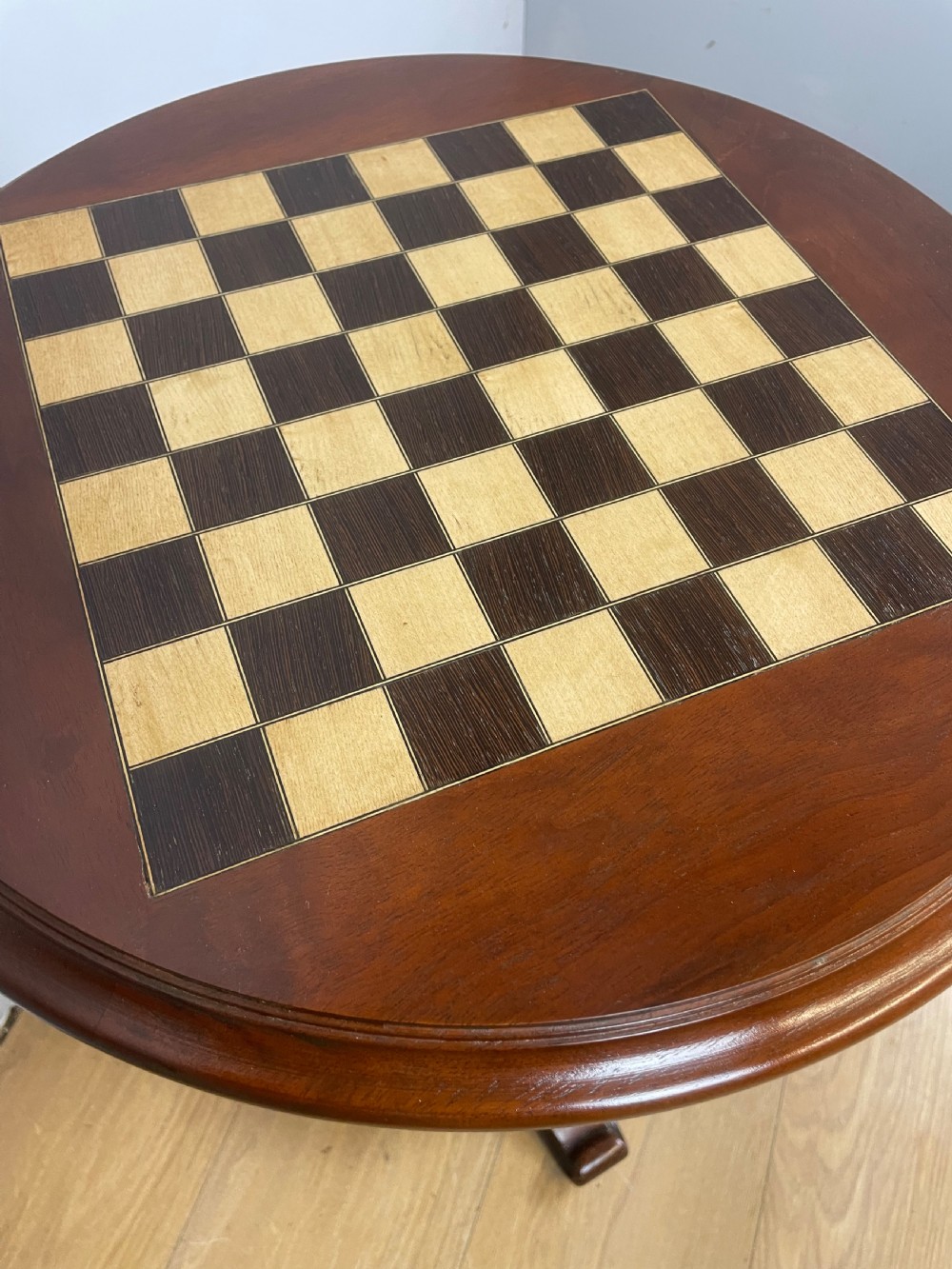C19TH walnut games table on a carved base  View VI
