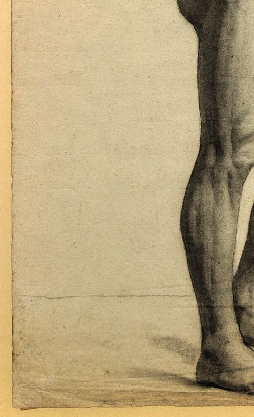 fig 6. A framed mid-nineteenth-century charcoal drawing on paper depicting a standing male nude figure in profile.