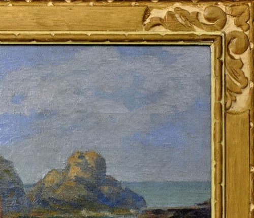 fig 4. An antique framed oil painting depicting a wooden sailboat anchored in a rocky coastal inlet with reflections on the water surface.