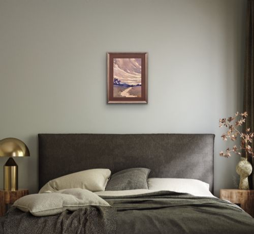 fig 9. A framed 1932 Art Deco watercolour painting depicting a winding stream through a landscape in shades of muted purple and buff.