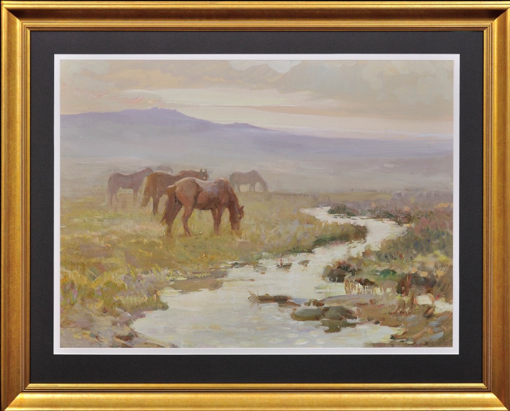 Framed 1930s oil painting depicting wild ponies grazing near a winding stream on Dartmoor under a soft sky.