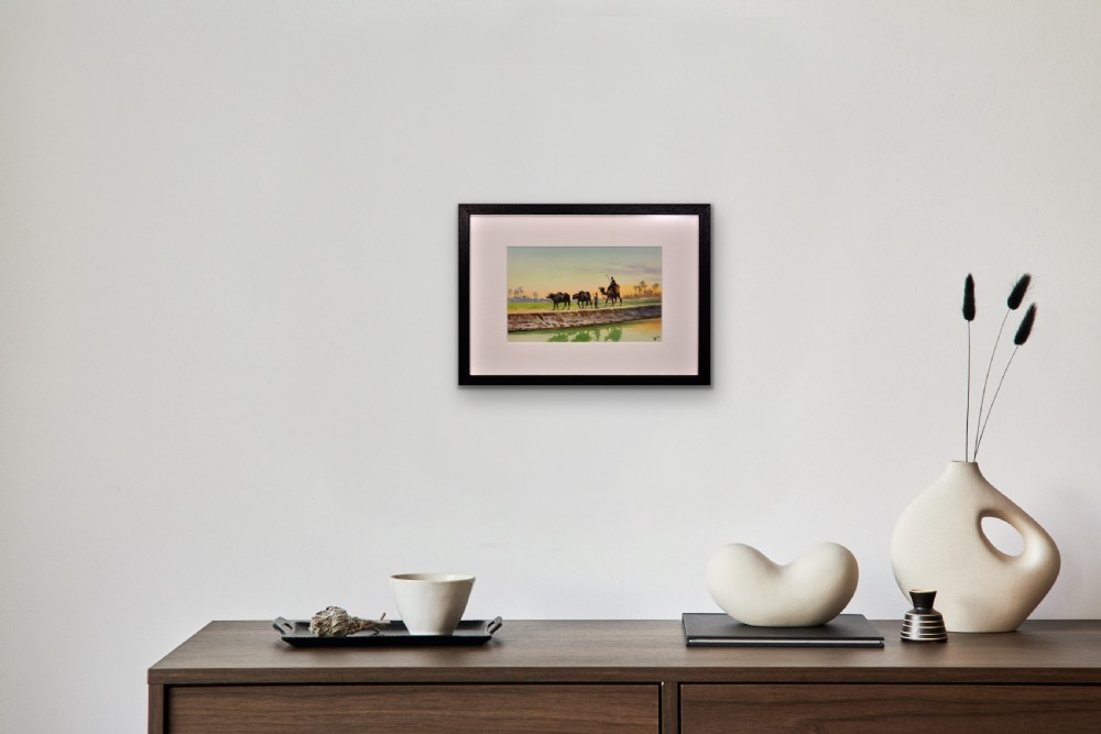 A framed watercolour painting depicting Egyptian farmers leading livestock and a rider on a camel along a canal bank at sunset. View XIII