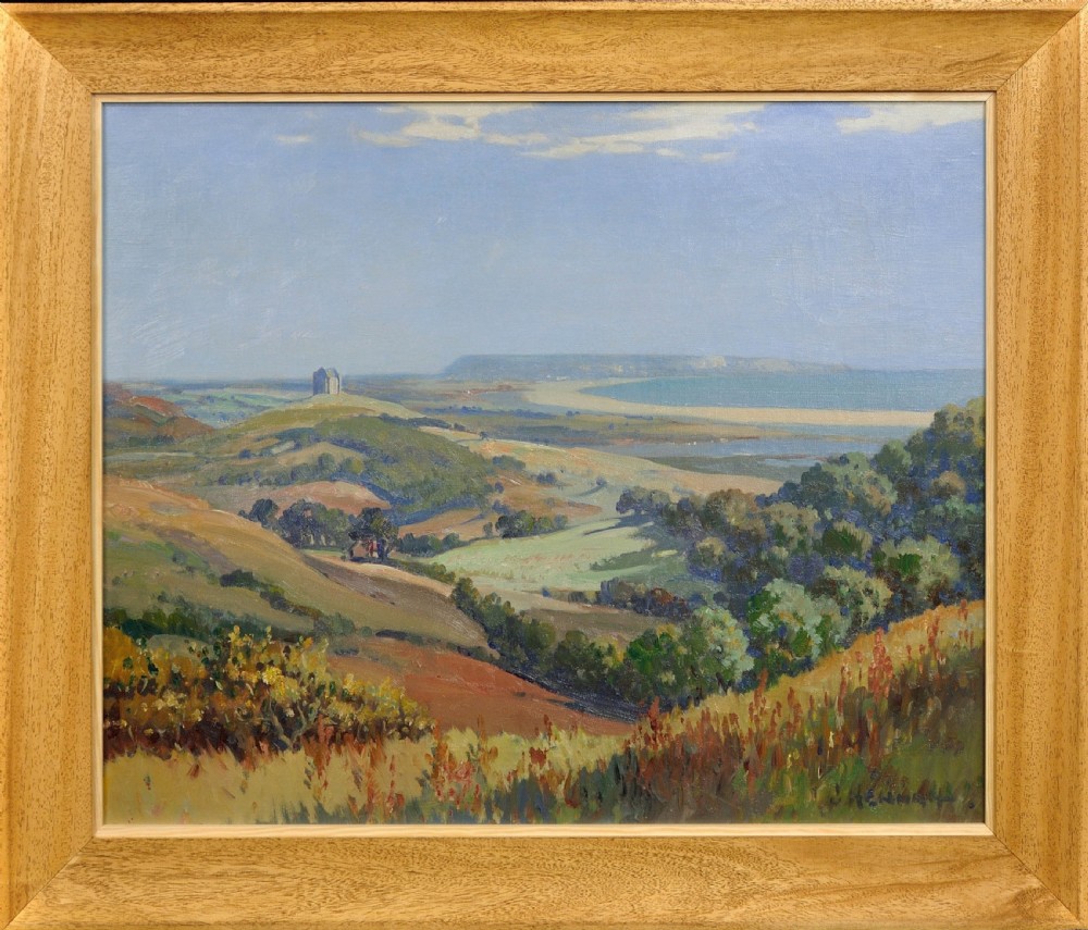 A framed oil painting depicting a rolling green and ochre coastal landscape overlooking Chesil Beach and Portland under a pale blue sky.