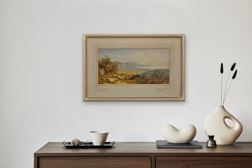 A framed nineteenth-century watercolour painting depicting sheep resting on a grassy hill overlooking the Swansea Bay estuary. View XVI
