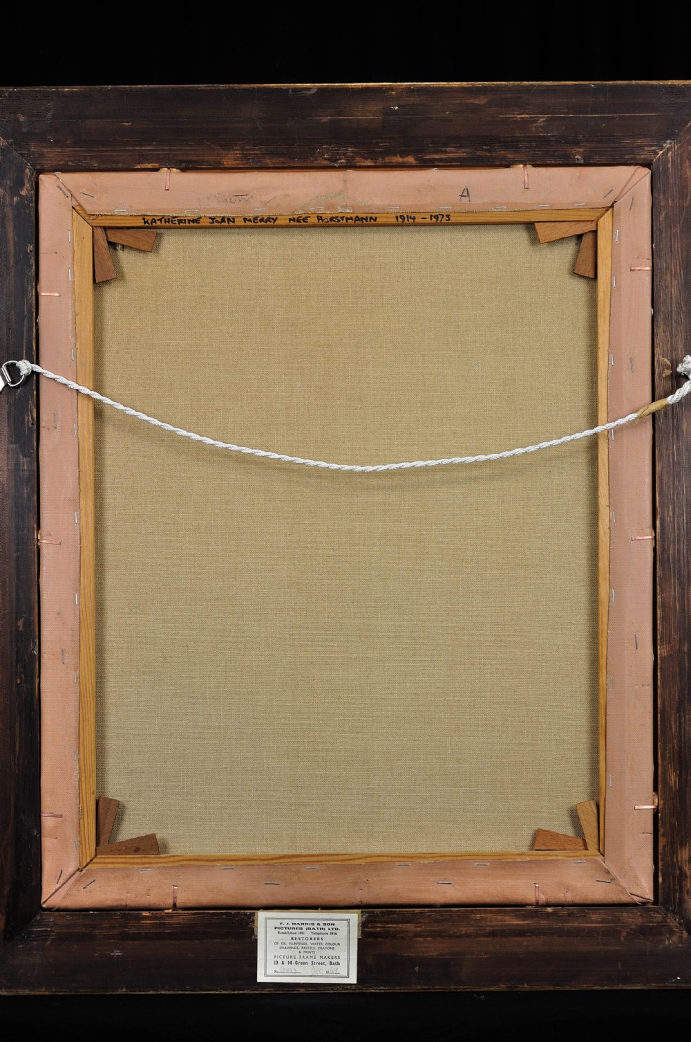 A mid-20th-century framed oil painting depicting a woman in a green outfit within a gilded wooden frame. View V