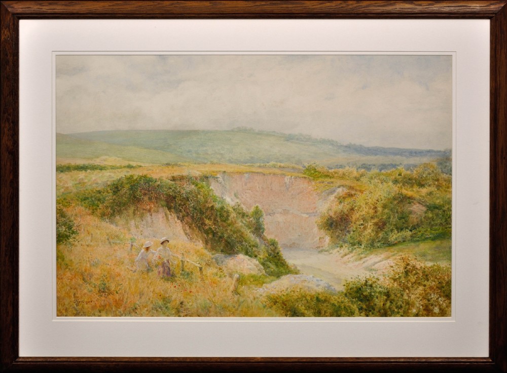 A framed Victorian watercolour painting depicting figures near a chalk quarry in the Sussex countryside, presented in a dark timber frame with a white mount.