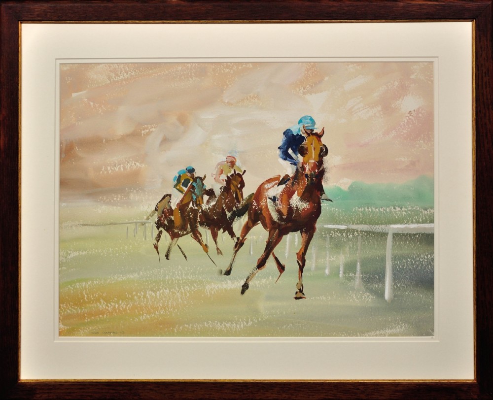 A framed mid-20th century watercolour and gouache painting depicting three jockeys riding racehorses at speed along a course.
