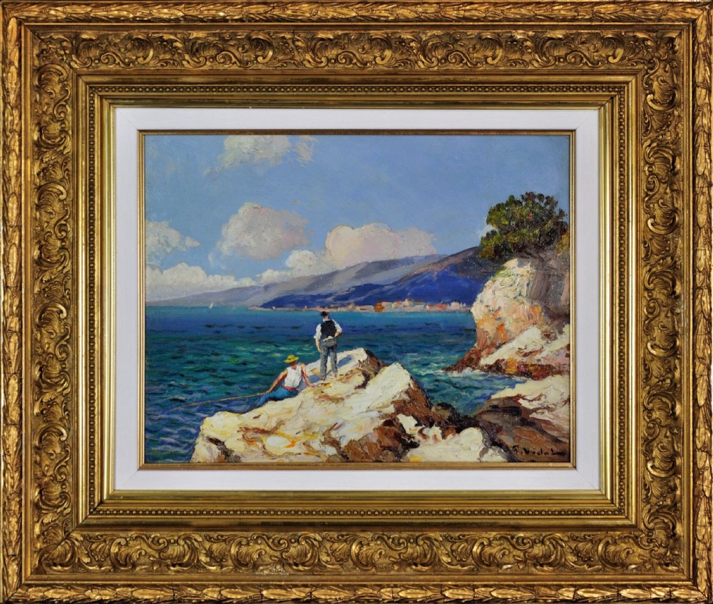 An original 1930s French coastal oil painting depicting fishermen on rocky shores along the blue sea, presented in an ornate gilt wood frame.