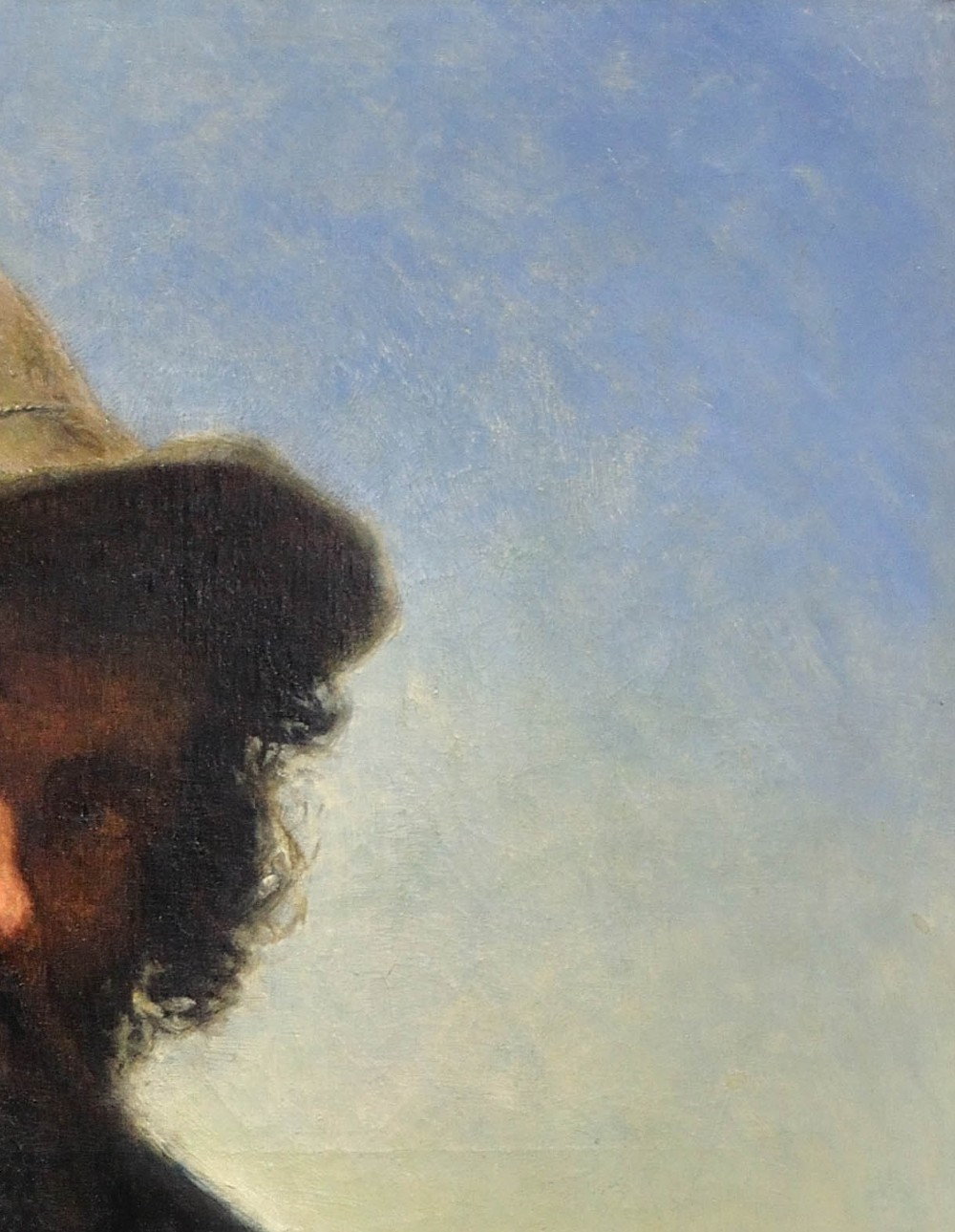 A 19th-century framed oil portrait depicting a bearded man wearing a hat and dark coat against a soft landscape background, housed in an ebonised frame with a gilt slip. View VII