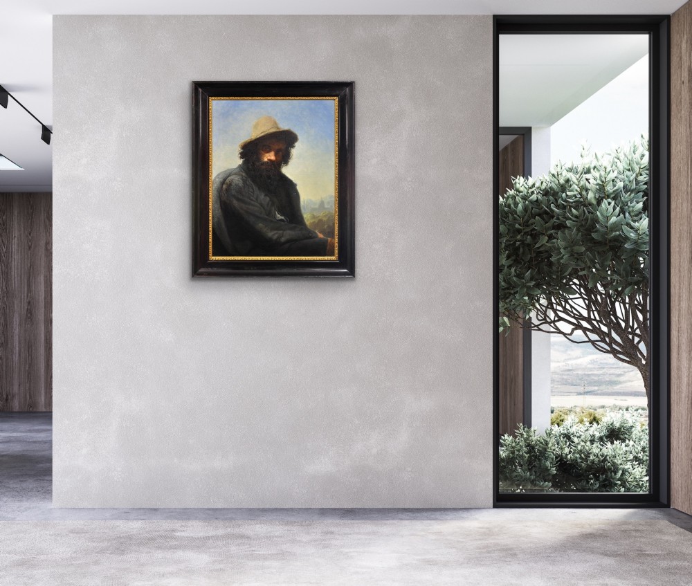 A 19th-century framed oil portrait depicting a bearded man wearing a hat and dark coat against a soft landscape background, housed in an ebonised frame with a gilt slip. View X