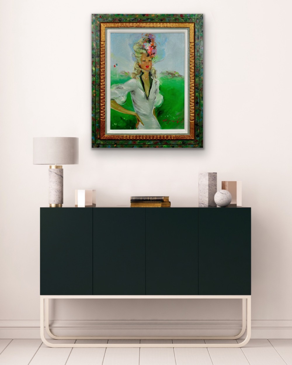 A mid-century oil painting depicting a blonde woman in a white dress and elaborate hat standing before a green racecourse, set within a textured gilt and painted frame. View XII