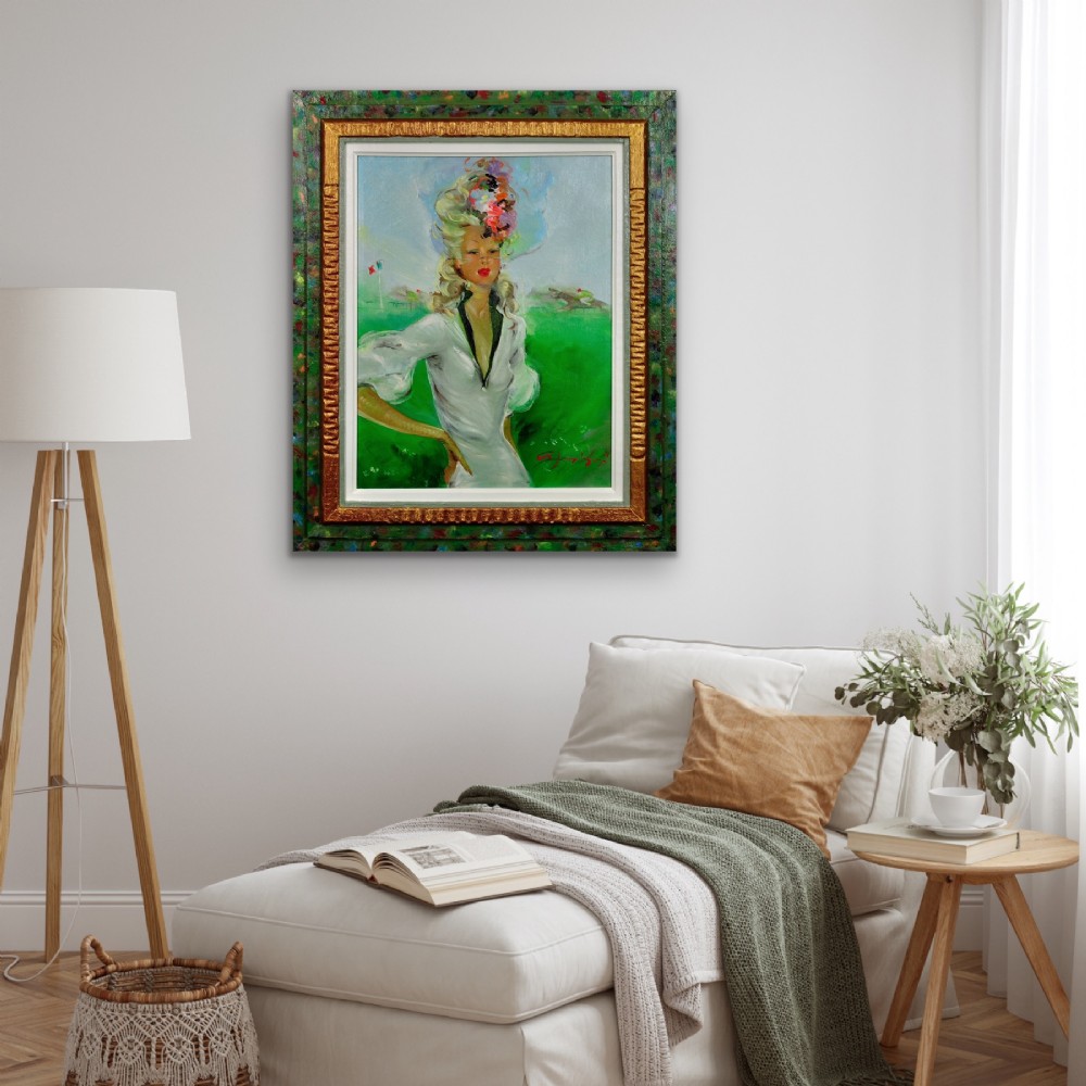 A mid-century oil painting depicting a blonde woman in a white dress and elaborate hat standing before a green racecourse, set within a textured gilt and painted frame. View XIII