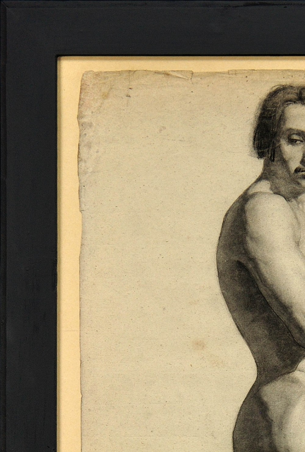 A framed mid-nineteenth-century charcoal drawing on paper depicting a standing male nude figure in profile. View IV