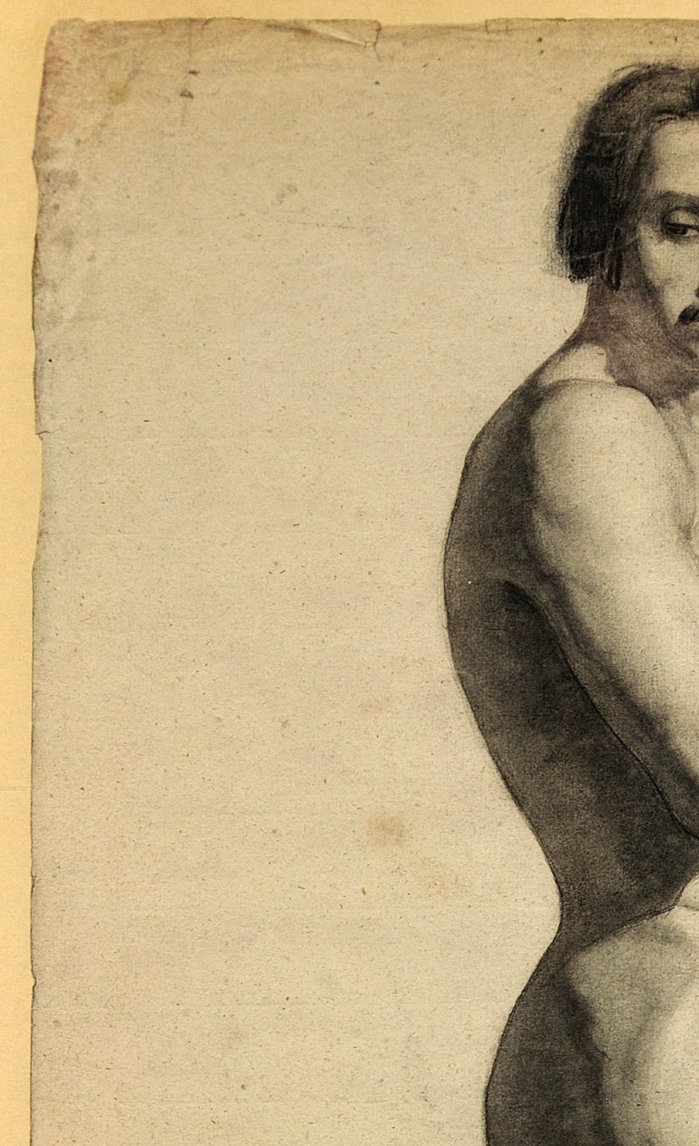 A framed mid-nineteenth-century charcoal drawing on paper depicting a standing male nude figure in profile. View V
