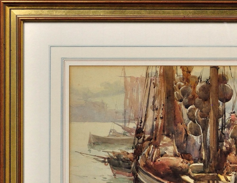 A framed 1893 watercolour painting depicting a Moray Firth Zulu fishing boat docked alongside a busy harbour wall while fishermen unload the herring catch. View V