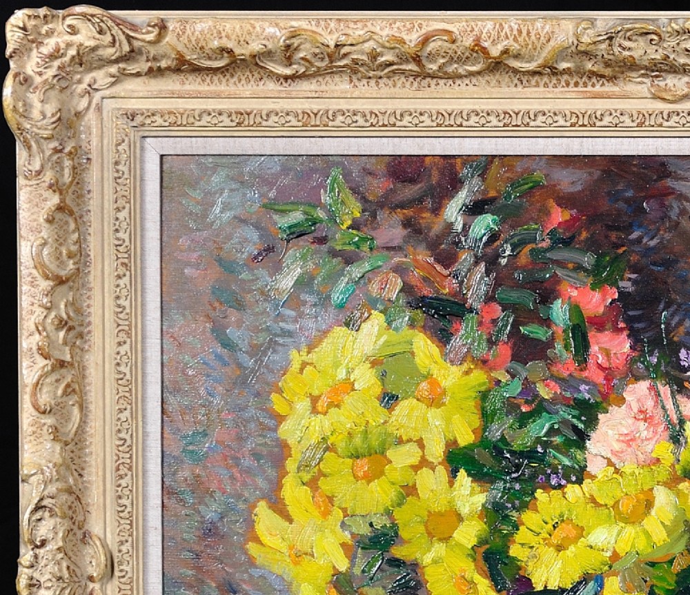 Framed French oil painting depicting a floral still life arrangement of yellow marigolds and red carnations in a dark pedestal vase. View V