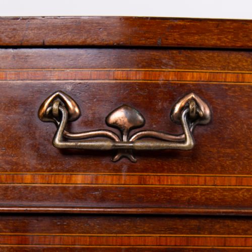 fig 3. A matching pair of dark mahogany Edwardian cabinets featuring five inlaid drawers, slender cabriole legs, and an open top tray shelf.