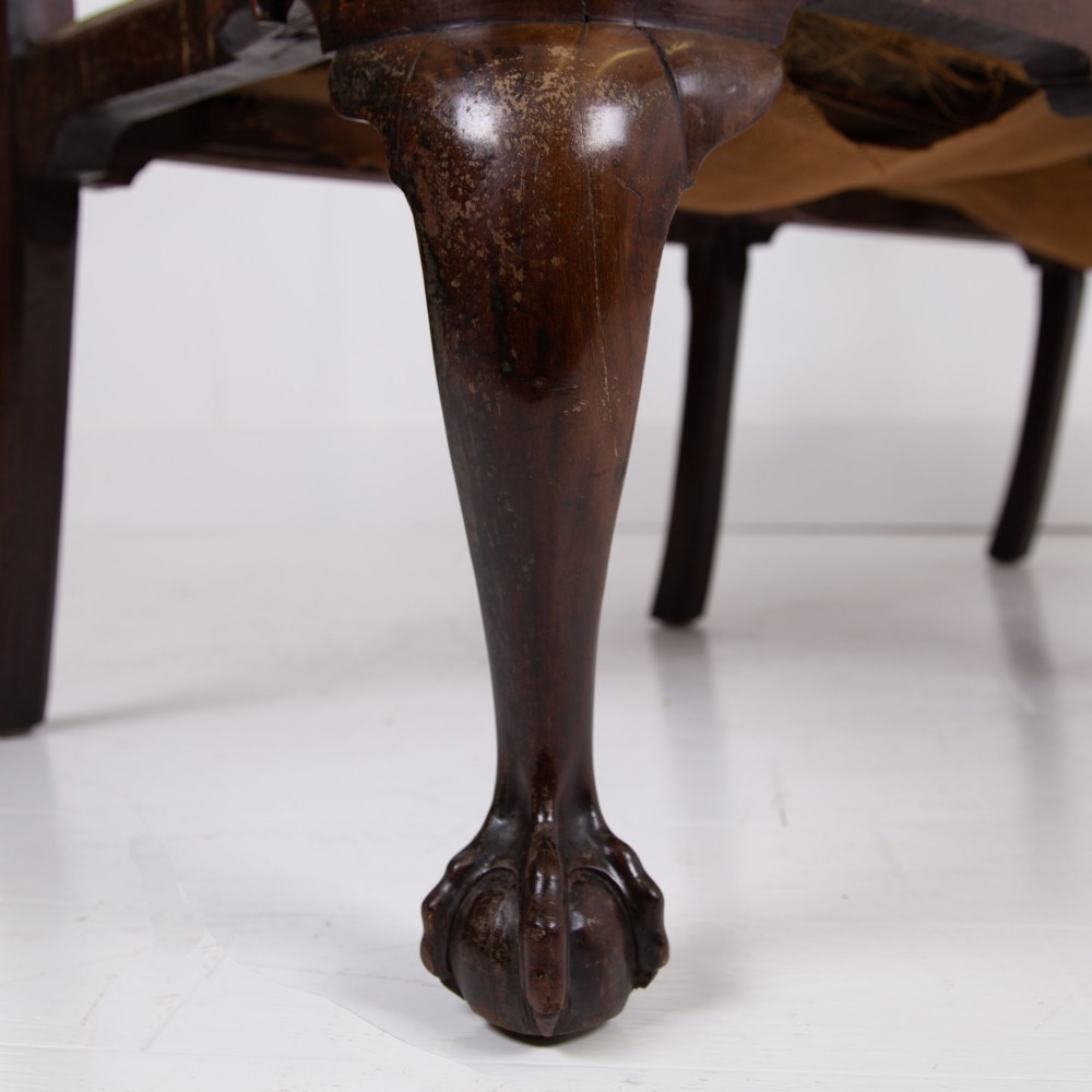 A George II revival double chair-back mahogany settee featuring carved vase splats, cabriole legs with claw and ball feet, and a green upholstered seat. View VII