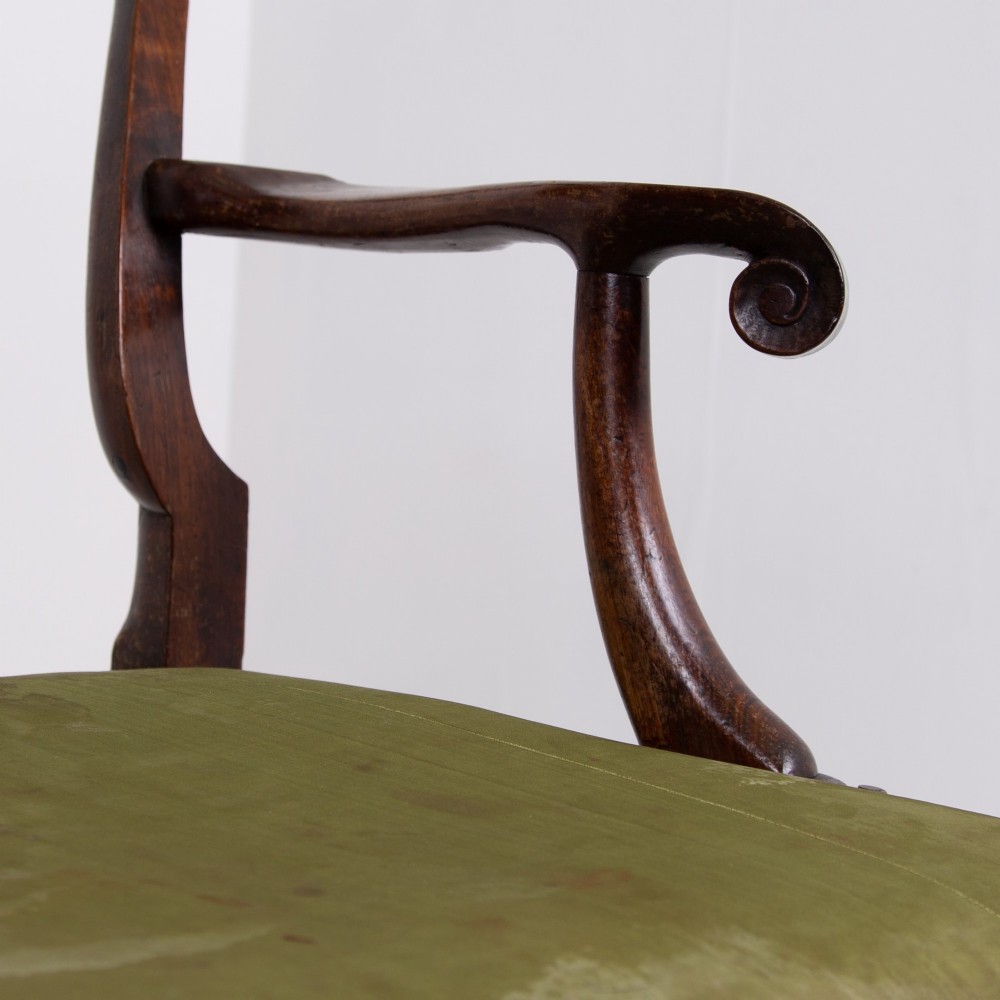 A George II revival double chair-back mahogany settee featuring carved vase splats, cabriole legs with claw and ball feet, and a green upholstered seat. View IX